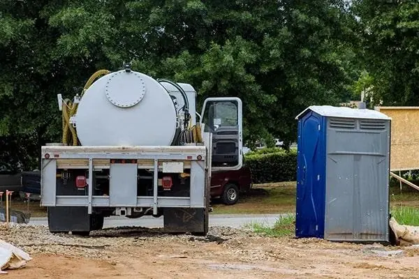 Illustrative portable sanitation service truck and equipment